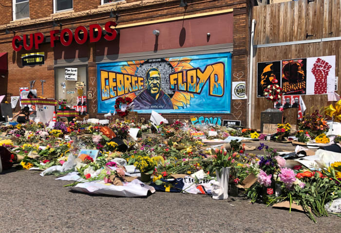 A memorial for George Floyd outside of Cup Foods